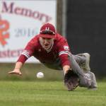PHOTO BY FOREST WORGUM Hoquiam outfielder Danton Cole dives for ball during a loss to Elma on Monday at the Elma Ballfields.
