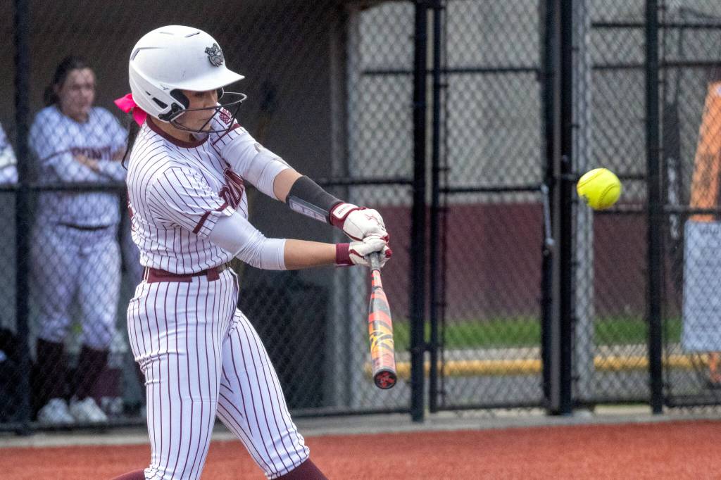 PHOTO BY FOREST WORGUM Montesanos Jaelyn Butterfield connects on a pitch during at 21-5 win over Hoquiam on Thursday at Montesano High School.