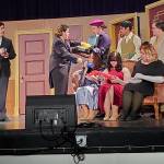 In the study, Wadsworth hands out the gifts, which are the murder weapons featured in the game, that Mr. Boddy (Connor Watkins) procured for his guests. 
Andrea Watts / The Daily World