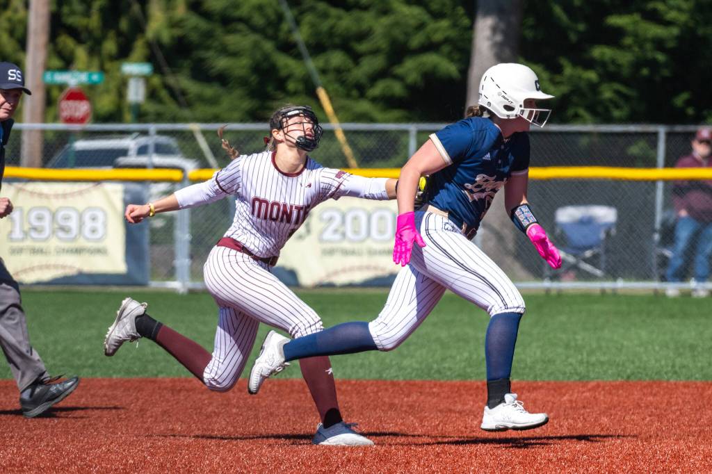 PHOTO BY FOREST WORGUM Montesano third baseman Lex Stanfield (left) applies the tag to a Cedar Park Christian runner during a 10-2 win on Friday at Dick Tagman Field in Montesano.