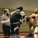 Carl Steele executes a version of the back breaker on the ropes while the referee gives a warning at Equinox Eruption Saturday.