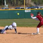 RYAN SPARKS / THE DAILY WORLD 
Aberdeens Britten Neal (left) slides back into second base while W.F. Wests Taylor Tobin receives a throw during the Bobcats 8-5 win on Monday in Aberdeen.