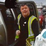 Jerry Knaak / The Daily World
Daniel, who works at Safeway, is shown here loading a car with groceries.