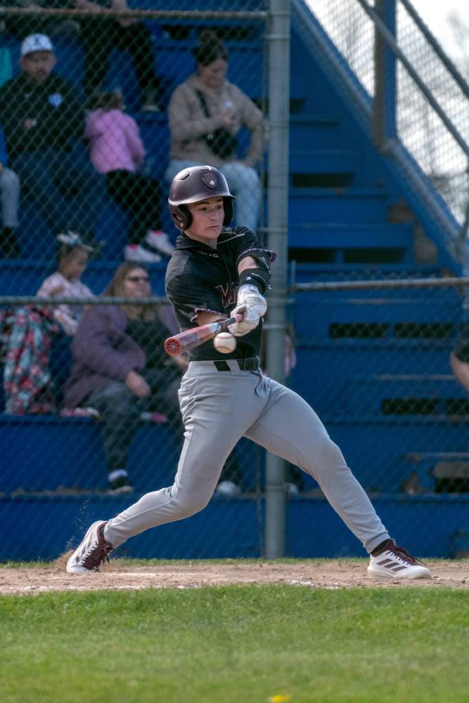 PHOTO BY FOREST WORGUM Montesanos Zach Timmons squares up a pitch during a doubleheader against Elma on Tuesday in Elma.