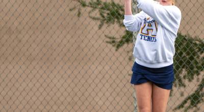 PHOTO BY FOREST WORGUM Aberdeen singles player Sophie Knutson volleys a shot during the Bobcats 4-2 win over W.F. West on Thursday in Aberdeen.