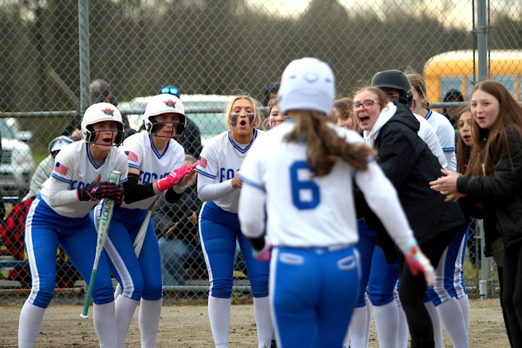 RYAN SPARKS | THE DAILY WORLD Elmas Sophie Jones (6) is greeted by her teammates after hitting a home run in a loss to Shelton on Thursday in Elma.