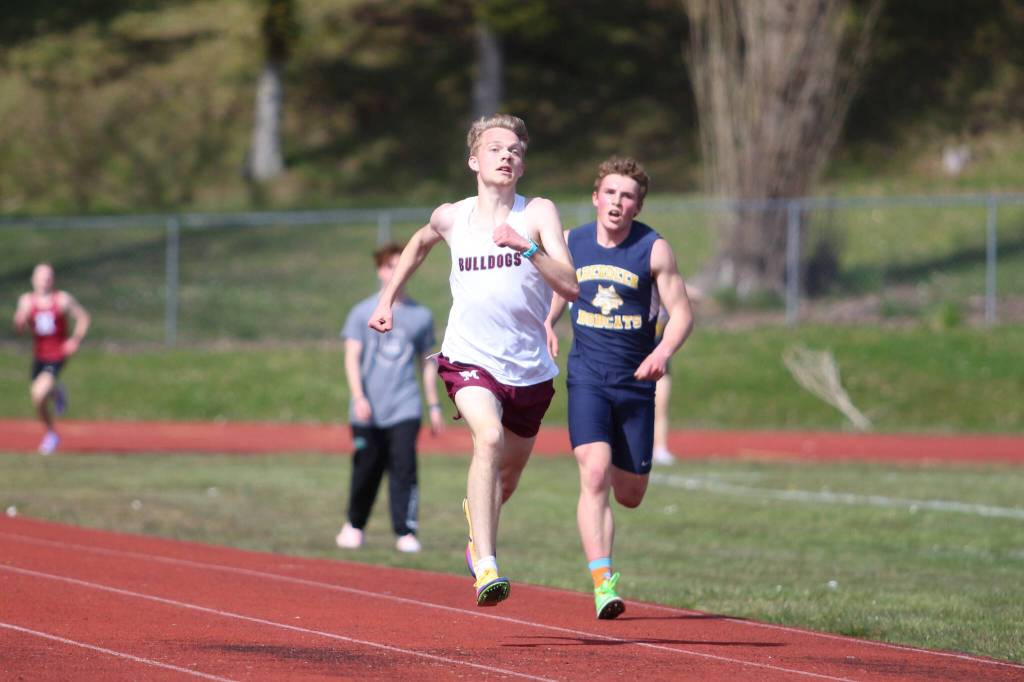 RYAN SPARKS | THE DAILY WORLD Montesanos Benny Anderson (left) outruns Aberdeens Cecil Gumaelius down the stretch of the boys 3,200-meter race at the Ray Ryan Memorial GHC Championships on Saturday at Hoquiam High School.