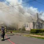 The Daily World photos
Firefighters respond to a house fire on the 1800 block of West 6th Street in Aberdeen Thursday.