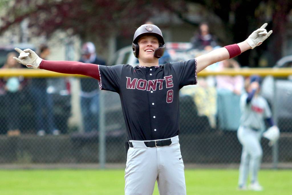 RYAN SPARKS | THE DAILY WORLD Montesanos Mason Fry acknowledges his teammates after belting a double during a 13-1 win over Kings Way Christian on Saturday in Montesano.