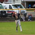 RYAN SPARKS | THE DAILY WORLD Montesanos Kolson Hendrickson ranges back to the outfield grass to make a catch during a 13-1 win over Kings Way Christian on Saturday in Montesano.