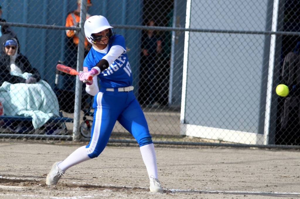 RYAN SPARKS | THE DAILY WORLD Elmas Lynsee Bednarik collects a hit during a 10-0 win over Hoquiam on Monday at Elmas Legacy Ballfields. Bednarik was one of four Eagles with two-hit games in the win.