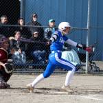 RYAN SPARKS | THE DAILY WORLD Elmas Raelynn Weld belts a three-run triple during a six-run fourth inning in a 10-0 win over Hoquiam on Monday in Elma.
