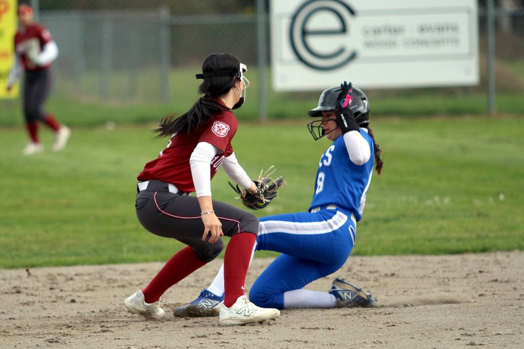 RYAN SPARKS | THE DAILY WORLD Elmas Caroline Cole (right) is tagged out by Hoquiam shortstop Lexi LaBounty on an attempted steal during the Eagles 10-0 win on Monday in Elma.