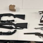During the search of the residence, detectives recovered seven firearms.