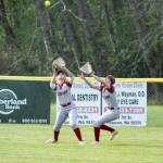 NICOLE SHANNON | MAIN FOCUS MEDIA Hoquiam outfielders Hailee Burgess (left) and Avery Brodhead track a fly ball during a 6-0 loss to Elma on Thursday in Hoquiam.