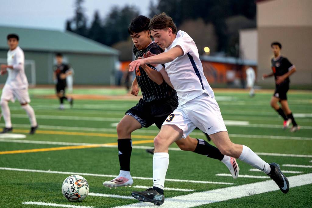 PHOTO BY FOREST WORGUM Aberdeens Yoanis Chignesse (right) races down the sideline during a loss to Centralia on Friday in Centralia.