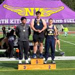 PHOTO COURTESY OF HARLEY REVEL Aberdeens Landon Hamblin (1) stands atop the podium after breaking a meet record in the shot put at the Dave Snyders Lil Norway Track & Field Invitational on Saturday at North Kitsap High School. Teammate Cole Revel (2) finished second.