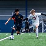 ALICIA TISDALE PHOTOGRAPHY Aberdeens Gibran Garcia (left) is defended by W.F. Wests Carson Newman during the Bobcats 2-0 loss on Tuesday at Stewart Field in Aberdeen.
