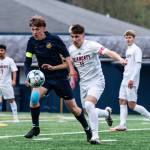 ALICIA TISDALE PHOTOGRAPHY Aberdeen defender Ryker Scott battles with W.F. Wests Alex Mathuzima during the Bobcats 2-0 loss on Tuesday at Stewart Field in Aberdeen.