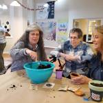 Andrea Watts / The Daily World
At Riverside Place Memory Care, residents and family members celebrated Earth Day by planting vegetable and flower seeds.