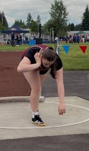 Hoquiams Sydney Gordon loads up to throw the shot put in a meet earlier this season.