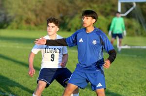 RYAN SPARKS | THE DAILY WORLD Elmas Manny Venegas (right) had two goals and two assists in a 12-0 win over Ilwaco on Friday at Davis Field in Elma.