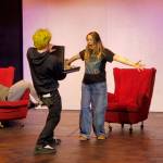 Andrea Watts / The Daily World
Mr. Wormwood (Casey Bronson) is showing Mrs. Wormwood (Julayne Fleury) the money he made by scamming the buyers of his cars.