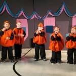 Andrea Watts / The Daily World
As was the case for other performances of Cinderella, the entrance of the pumpkins onto the stage prompted aahs. One girl in the audience ran up to give her brother a hug.