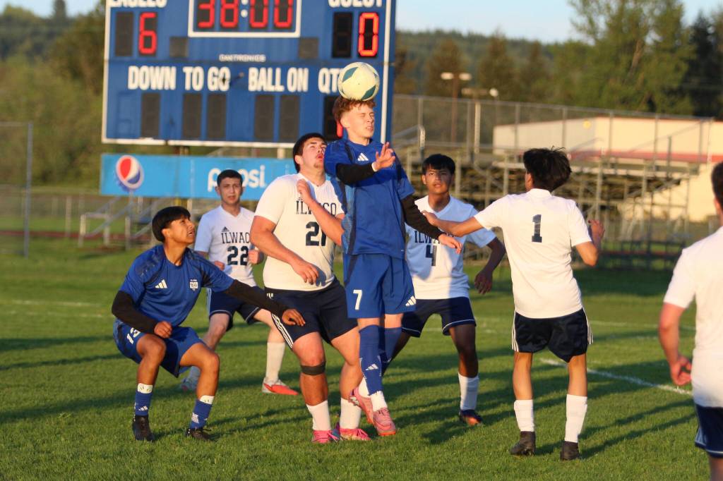RYAN SPARKS | THE DAILY WORLD Elmas Jordan Kain (7) gets his head on the ball during a 12-0 win over Ilwaco on Friday at Davis Field in Elma.