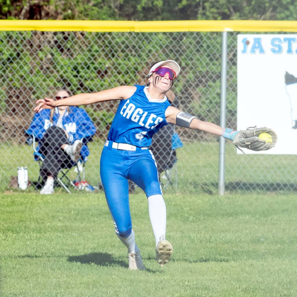 NICOLE SHANNON | MAIN FOCUS MEDIA Elma center fielder Kenna Monroe makes a running catch during a 5-0 loss to Montesano on Friday in Elma.