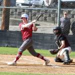 RYAN SPARKS | THE DAILY WORLD Hoquiams Joey Bozich smacks a base hit during a 5-3 loss to Montesano on Friday at Vessey Field in Montesano.