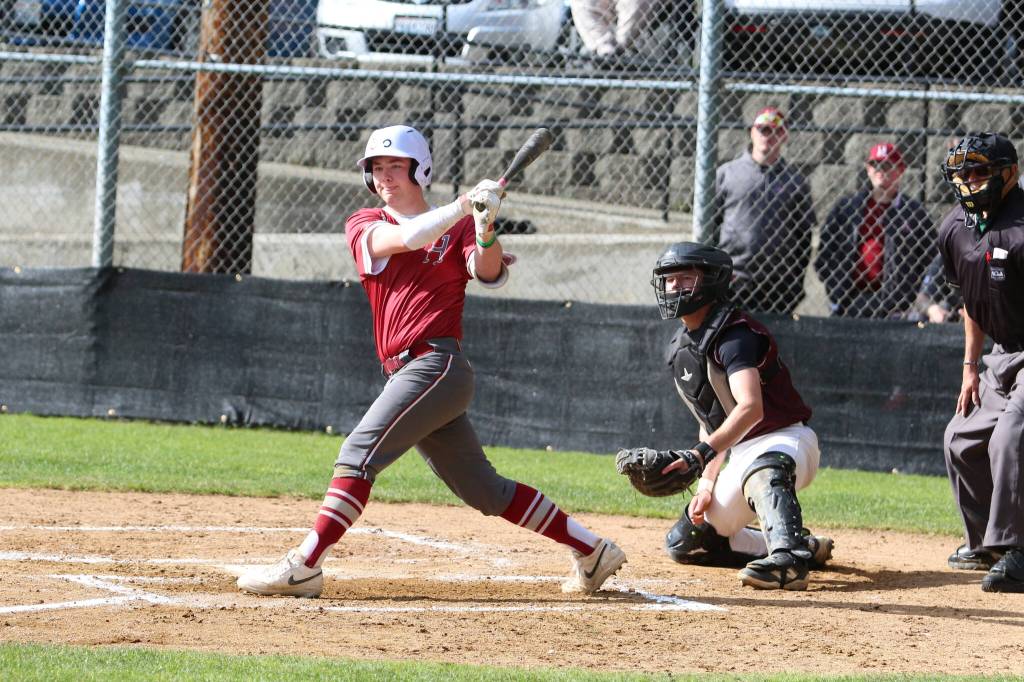 RYAN SPARKS | THE DAILY WORLD Hoquiams Joey Bozich smacks a base hit during a 5-3 loss to Montesano on Friday at Vessey Field in Montesano.