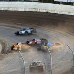 IMCA Modifieds power into turn one at high speed at the Grays Harbor Raceway Saturday with #58 Devon Reed leading.