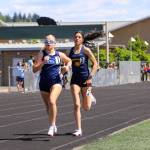 PHOTO BY DENNIS NELSON Aberdeens Mia Hallak (right) competes at the Beaver Dam Jam Invitational on Saturday in Woodland.