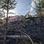 Firefighters battled steep terrain during a brush fire over the weekend.