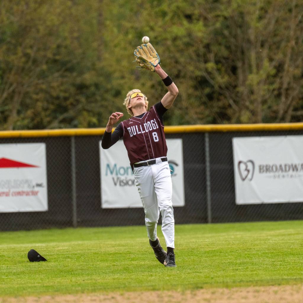 PHOTO BY FOREST WORGUM Montesano outfielder Mason Fry glides in to make a catch during a twin-bill sweep over Rochester on Tuesday in Montesano.