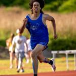PHOTO BY FOREST WORGUM Elmas Gilbert Rodriguez won the boys 400-meter race in a league meet on Thursday at Hoquiam High School.