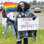 Jerry Knaak / The Daily World
A May Day rallygoer in Ocean Shores poses for a photo.