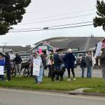 Jerry Knaak / The Daily World
May Day rally attendees line the median on Pt. Brown Ave. in Ocean Shores.