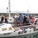 Pat Neal / For Peninsula Daily News
The Row West Team and their families share goodbye hugs.
