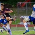 MATT RUMBLES PHOTOGRAPHY Raymond-South Bends Alex Posada (9) scores to tie Elma 3-3 on Wednesday in South Bend.