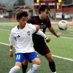 PHOTO BY CINDY MILES Elmas Ivan Rodriguez (11) and Raymond-South Bends Kingston Maneman compete for possession during a 3-3 tie on Wednesday in South Bend.