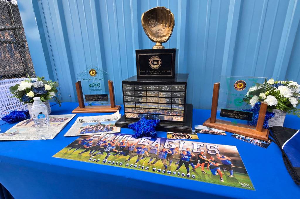 RYAN SPARKS | THE DAILY WORLD A display at a ceremony honoring former Elma softball coach Mitchell Todd, who passed away on May 3 in a vehicle accident, exhibits the 1A State Championship trophy, of which Elma won with the help of Todd in 2014.