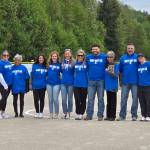 RYAN SPARKS | THE DAILY WORLD Family members of former Elma High School softball coach Mitchell Todd pose for a photo during a ceremony honoring Todd on Friday. Todd passed away in a traffic collision on May 3.