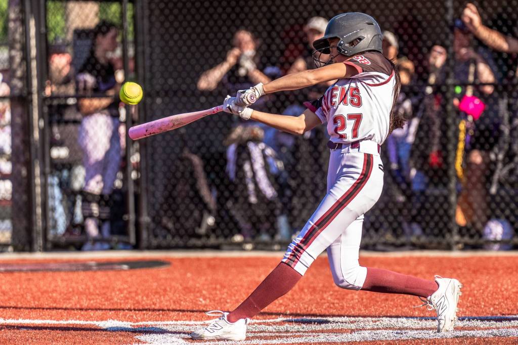 MATT RUMBLES PHOTOGRAPHY Raymond-South Bends Ryann Mark belts a double during a 5-3 win over Onalaska in a 2B District 4 Tournament game on Monday at Dick Tagman Field in Montesano.