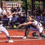 MATT RUMBLES PHOTOGRAPHY Raymond-South Bend catcher Ava Pine (right) records an out during a 5-3 win over Onalaska in a 2B District 4 Tournament game on Monday at Dick Tagman Field in Montesano.