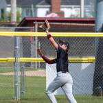 PHOTO BY FOREST WORGUM Montesano center fielder Tyson Perry ranges back to make a catch during a 10-0 win over La Center 1A District 4 quarterfinal game on Tuesday in Hoquiam.