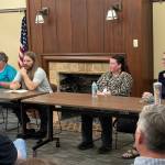 Jerry Knaak / The Daily World
From left: Timberland Regional Library trustees Toni Gwin and Dustin Loup, and TRL regional managers Tania Remmers and Evi Buell take questions from patrons at Hoquiam Timberland Library.