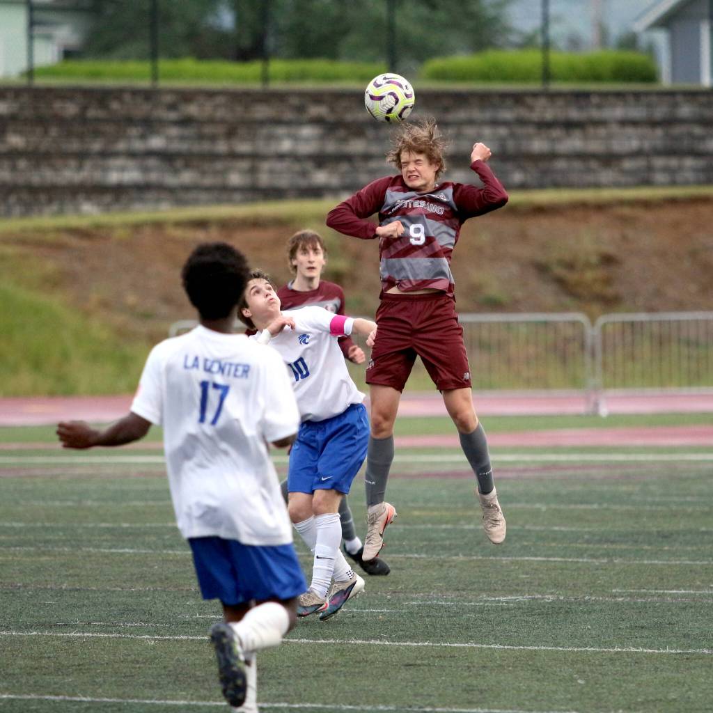 RYAN SPARKS | THE DAILY WORLD Montesanos Drew Bruland (9) get his head on the ball during a 3-2 loss to La Center in a 1A District 4 Tournament elimination game on Thursday at Montesano High School.