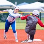NICOLE SHANNON | MAIN FOCUS MEDIA Elma shortstop Aubree Simmons tags out a Tenino runner during a 16-1 win in a 1A District 4 Tournament quarterfinal game on Friday in Centralia.
